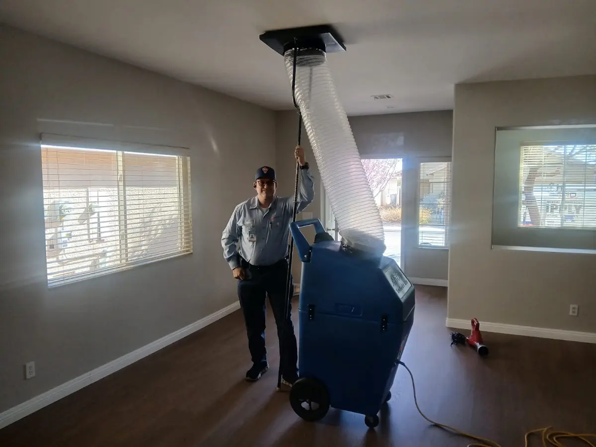 Professional Dryer Vent Cleaning work inside a Middle home